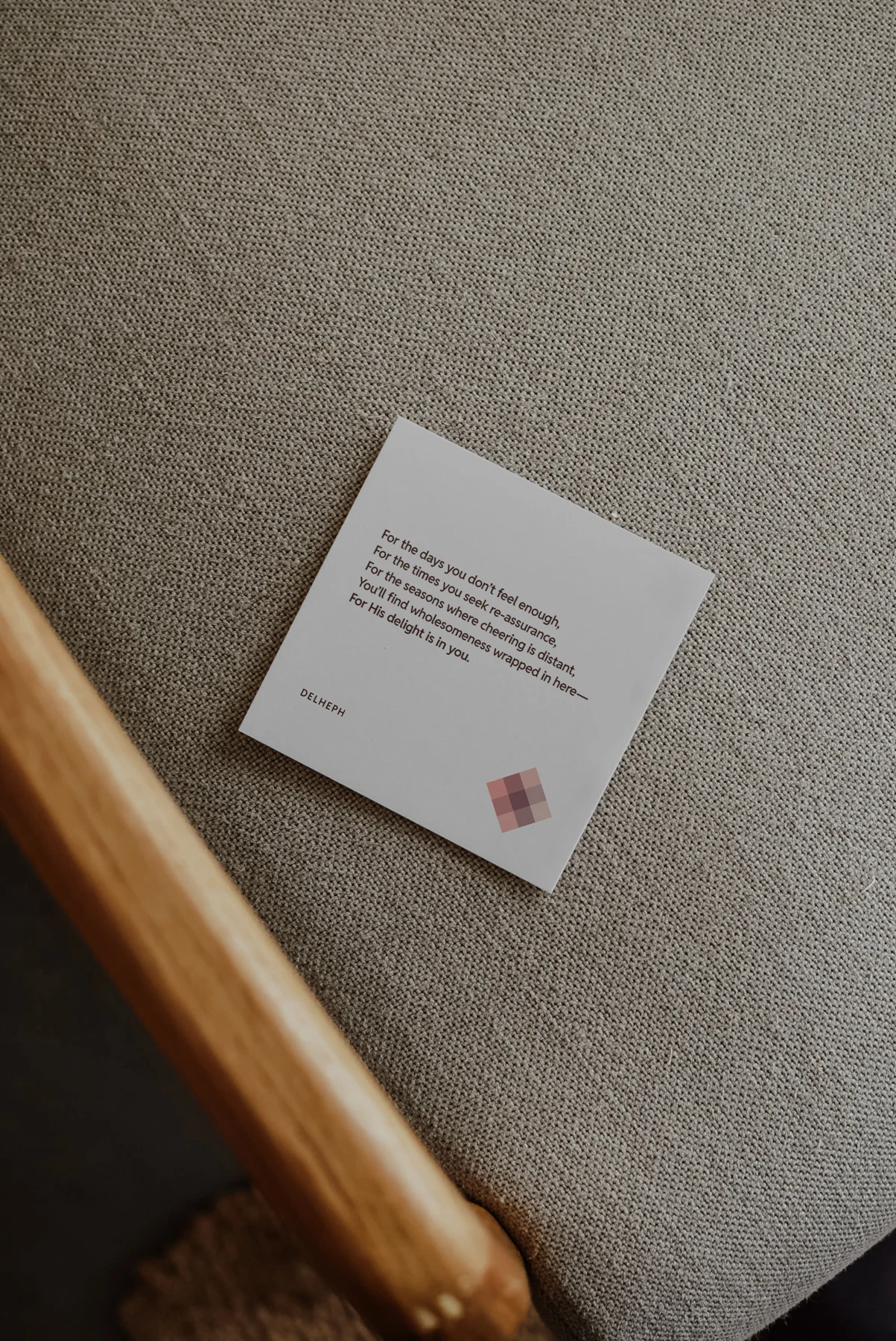 Del Heph delivery note card design arranged with textile